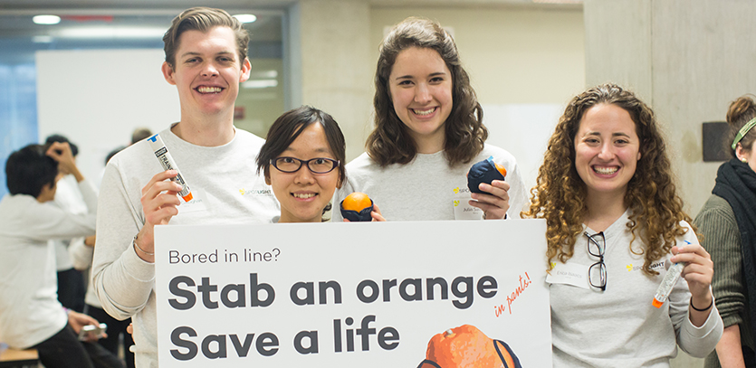 EDI students designed peer-to-peer education to take advantage of long lines during orientation.