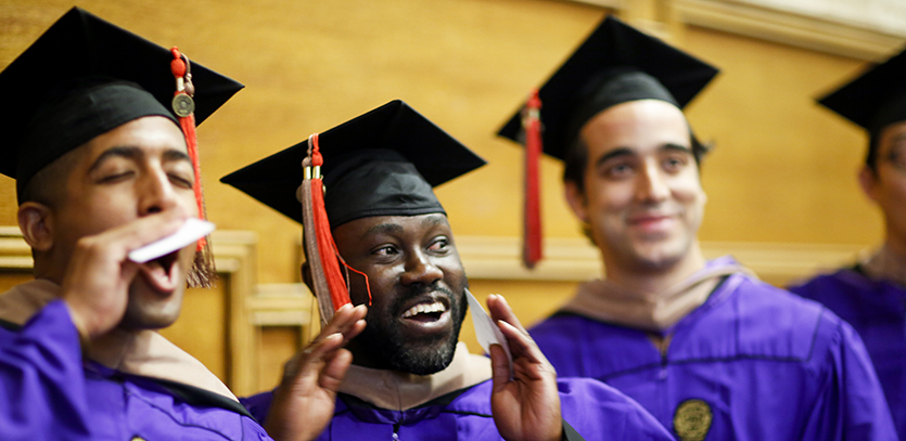 MMM graduates smile during the ceremony in Tech's Ryan Family Auditorium.