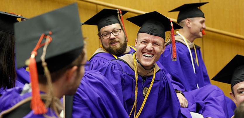 MMM graduates seated in Tech's Ryan Family Auditorium.