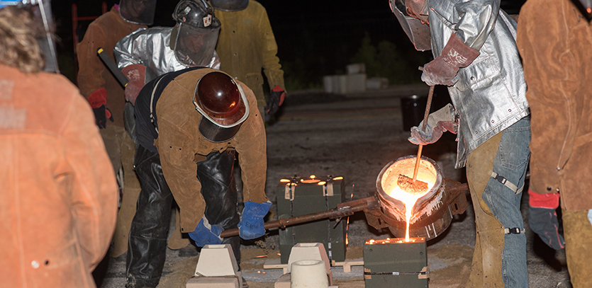 Northwestern students participate in an Iron Pour.