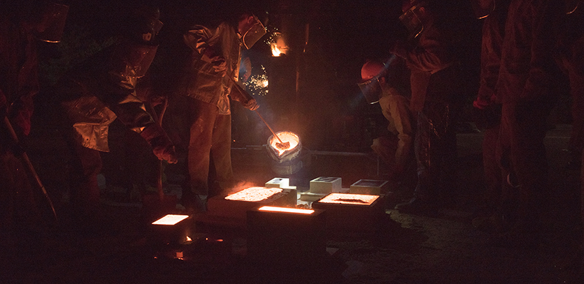 Northwestern students participate in an Iron Pour.