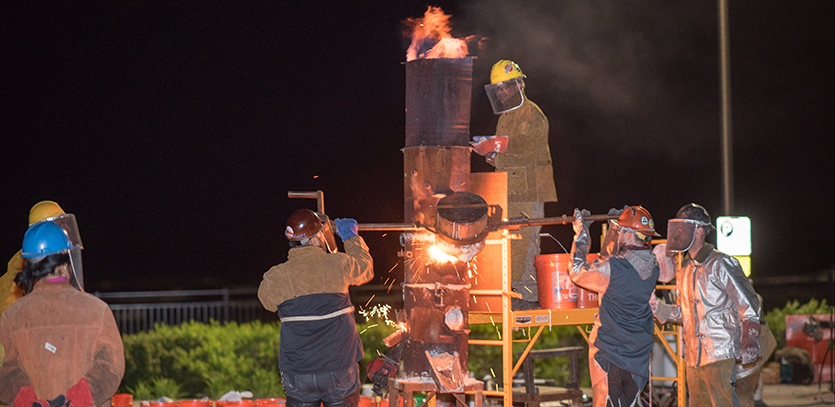 Northwestern students participate in an Iron Pour.