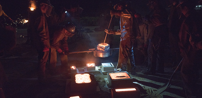 Northwestern students participate in an Iron Pour.
