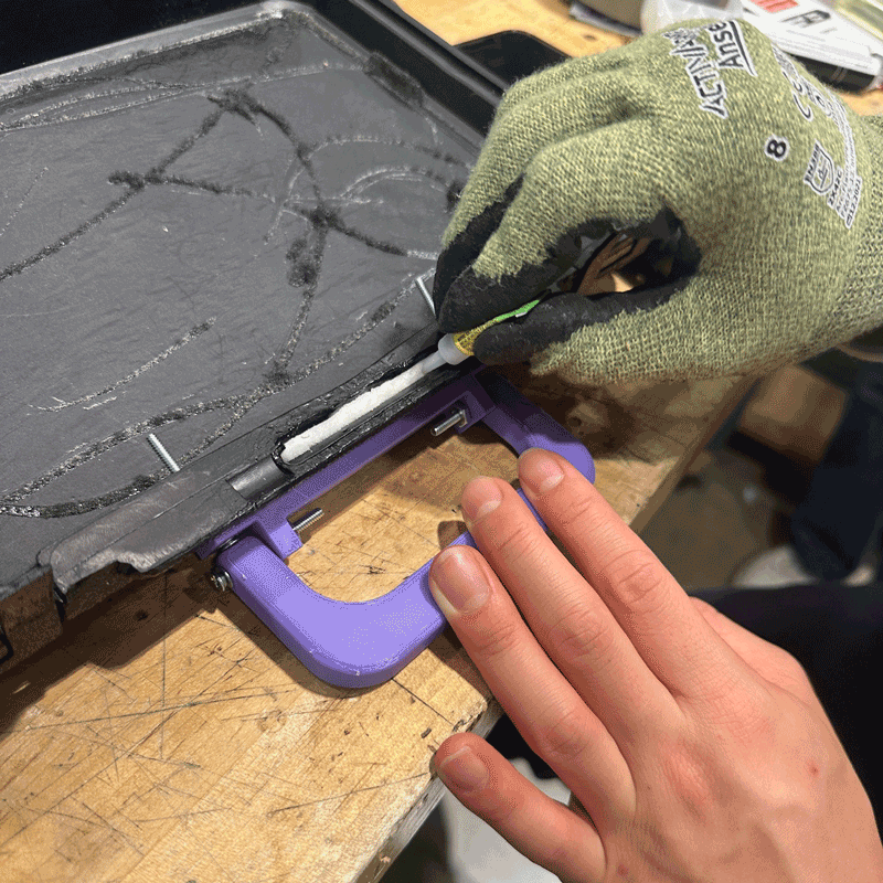 DTC students retrofitted a dynamometer case with magnets and an additional handle to prevent the cases from accidentally opening.