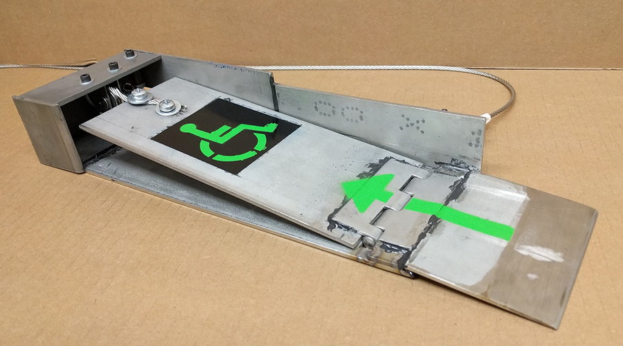 The Roll N Wash device presented by the team at the DTC Project Fair.